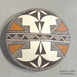 Fine line, kiva step and geometric design on a polychrome seed pot