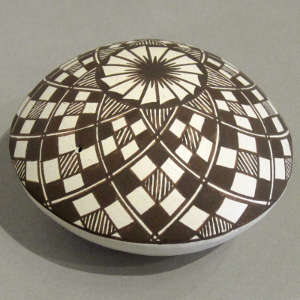 Geometric design on a black and white seedpot