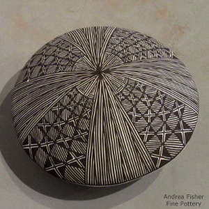 Fine line and geometric design on a black and white seedpot