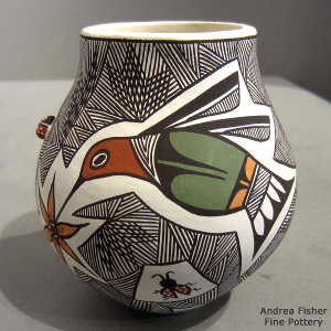 Hummingbird, lady bug, dragonfly, fine line and geometric design on a polychrome jar