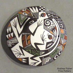 Lady bug, lizard, fine line and geometric design on a polychrome seed pot