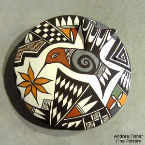 Hummingbird, flower and shard geometric design on a polychrome seed pot