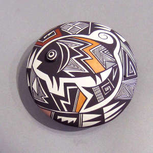 Fish and geometric design on a polychrome seed pot