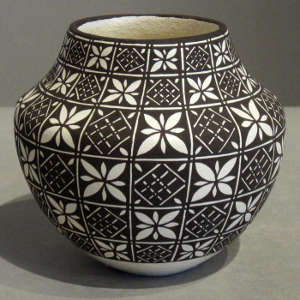 Geometric design on a black and white jar