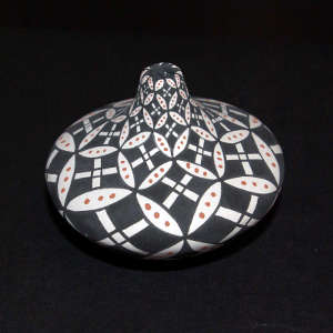 Geometric design on a thin neck polychrome jar