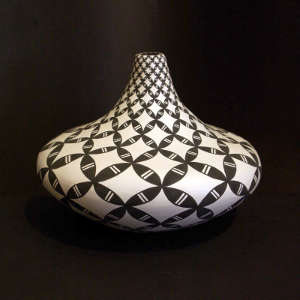 Geometric design on a black and white jar