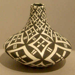 Geometric design on a black and white jar