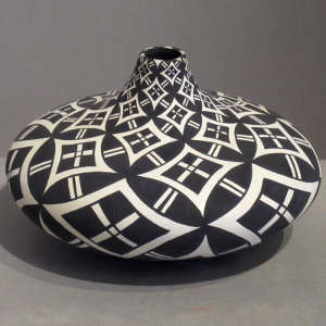 Geometric design on a black and white jar
