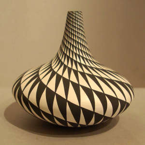 Mesa geometric design on a tall necked black and white jar