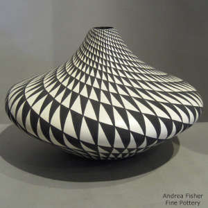 Swirl geometric design on a black and white jar