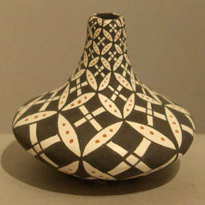 Geometric design on a black and white jar