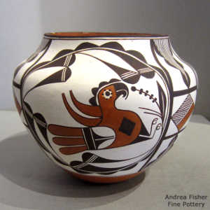 Parrot, floral and geometric design on a polychrome jar