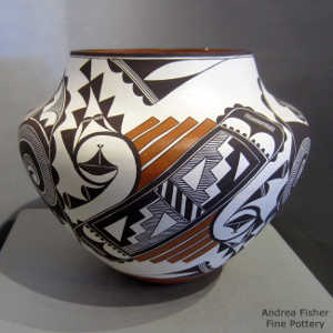 Kiva step, cloud, rain, bird element and geometric design on a polychrome jar