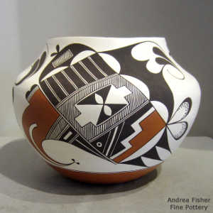 Bird element, shard, rain, kiva step and geometric design on a polychrome jar