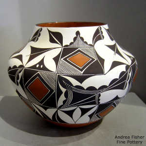 Shard, cloud, rain and geometric design on a polychrome jar