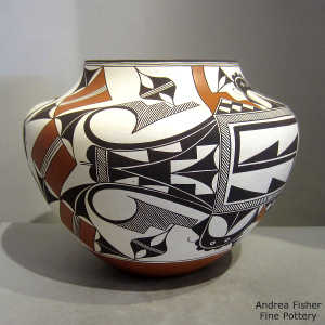 Bird element, rain, cloud, shard and geometric design on a polychrome jar