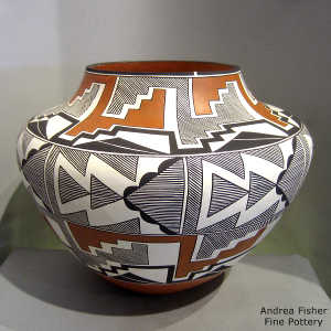 Kiva step, rain and geometric design on a polychrome jar