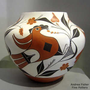 Parrot, branch and geometric design on a polychrome jar