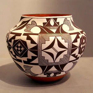 Black and white geometric design on a polychrome jar