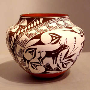 Deer, heart line and geometric design on a polychrome jar