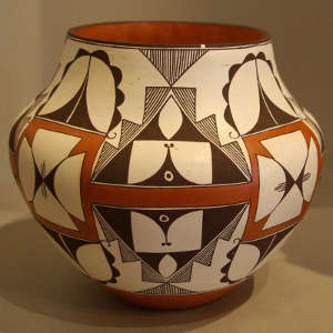 Click to see a larger version A shard, medallion and geometric design on a polychrome jar