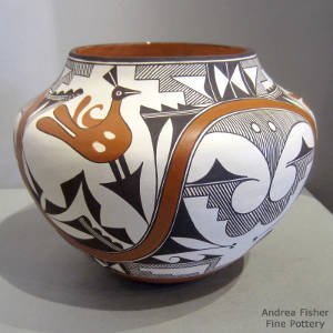 Bird fine line, rainbow and geometric designs on a polychrome jar