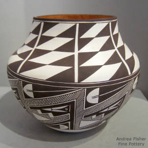 Black and white geometric design on a polychrome jar