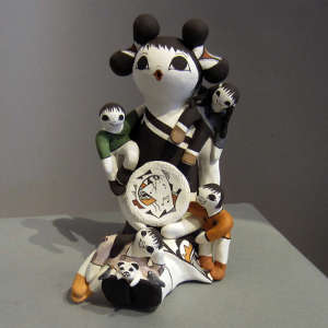 Traditional designs on a storyteller with four children