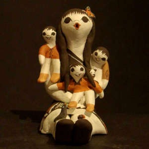 Three children, puppy, bird and ladybug on a storyteller