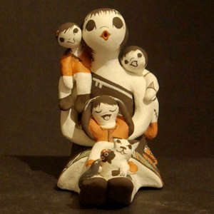 Three children, kitten, bird and ladybug on a storyteller