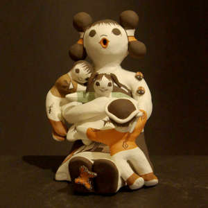 Three children, a butterfly and two ladybugs on a storyteller