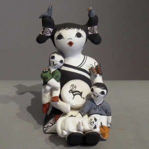 Click to see a larger version Two children, birds, cat, lady bug, butterfly and Mimbres designs on a female storyteller