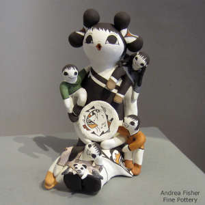 Four children, cat, birds and butterfly on a storyteller