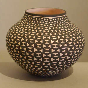 Geometric design on a black and white jar