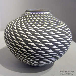 Geometric design on a black and white jar