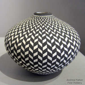 Geometric design on a black and white jar