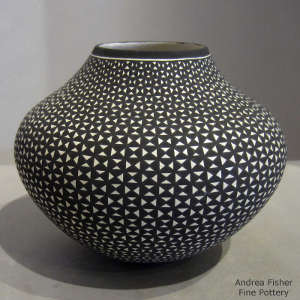 Geometric design on a black and white jar