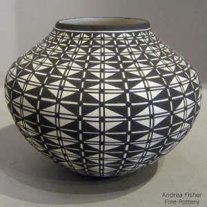Geometric design on a black and white jar