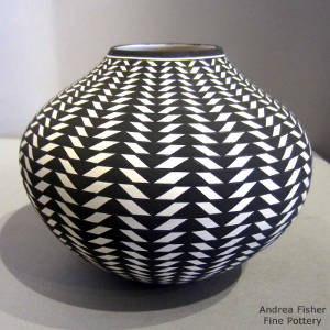 Geometric design on a black and white jar