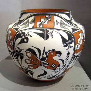 Rainbow, shard, parrot and geometric designs on a polychrome olla