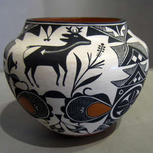 Traditional and contemporary designs on a polychrome jar