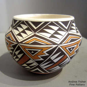 Shard and geometric design on a polychrome jar