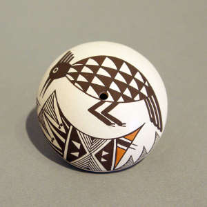 Mimbres-style bird and geometric design on a polychrome seed pot
