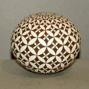 Geometric design on a black and white seed pot