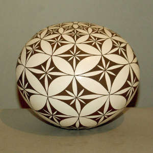 Geometric design on a black and white seed pot