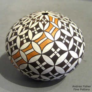 Swirl geometric design on a polychrome seed pot