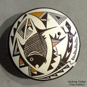 Mimbres fish, lizard and geometric design on a polychrome seed pot