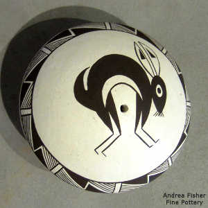 Mimbres rabbit and geometric design on a black and white seed pot