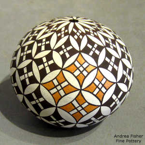 Geometric design on a polychrome seed pot