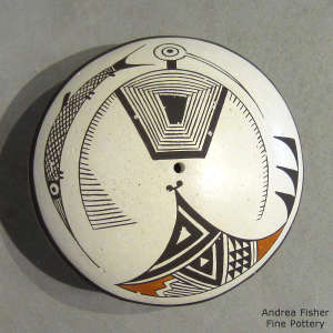 Mimbres bird, fish and geometric design on a polychrome seed pot